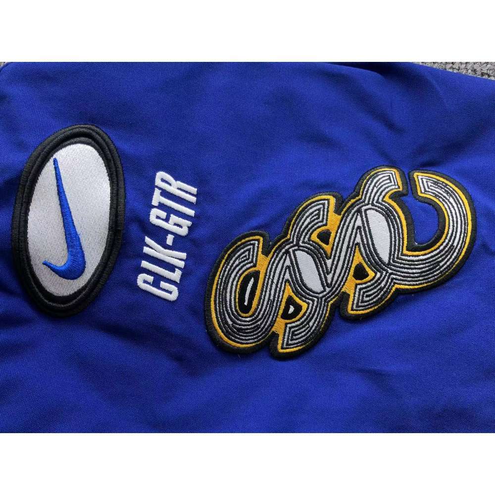 NIKE X NOCTA L'ART DE L'AUTOMOBILE RACING JACKET