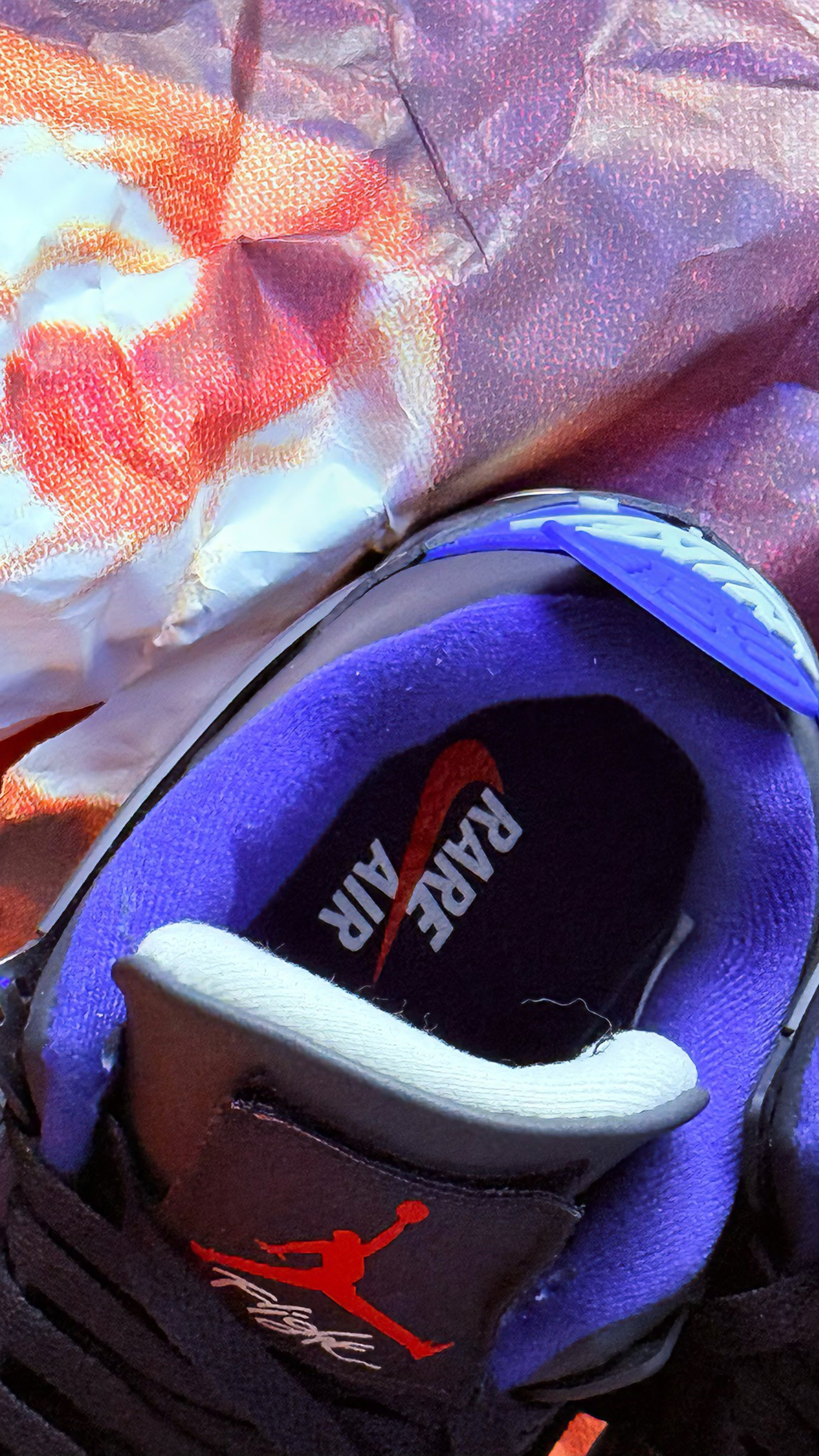 Air Jordan 4 Retro
“ Rare Air “