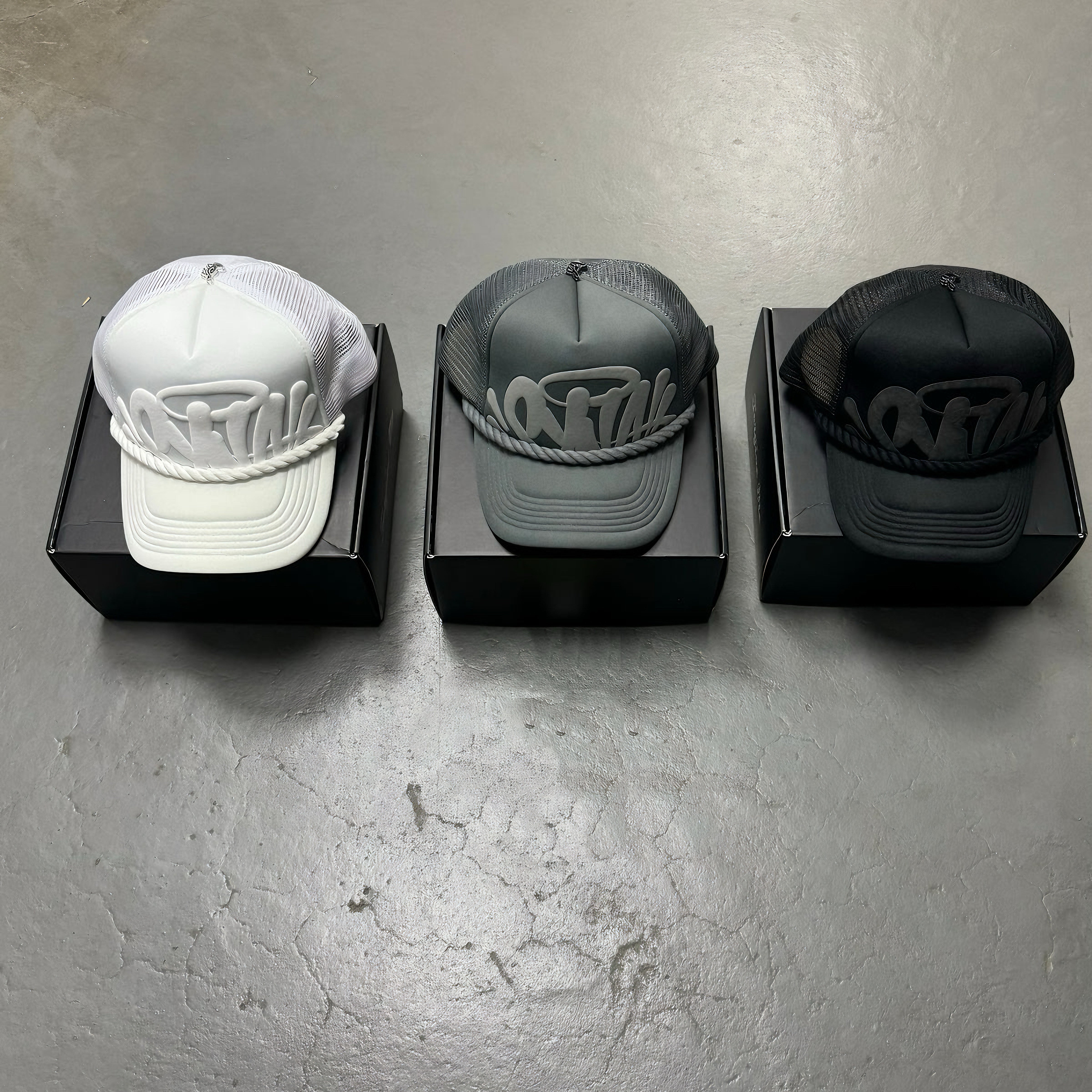 SYNA WORLD TRUCKER HAT CENTRAL CEE